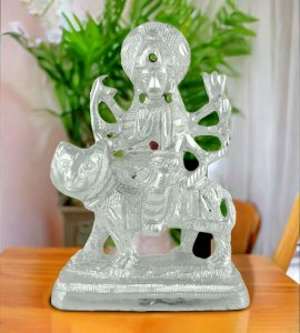 Durga maa statue: Beautifully handcrafted and ornamented Durga Maa Murti, glows with sllvery glitters, made with glittery material.