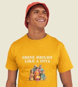 Shine bright like a diya text printed diwali themed unisex round neck blended yellow t-shirt specially for diwali festival